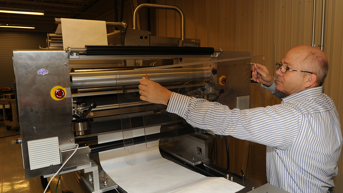 Print technician servicing a FlexPrint mini