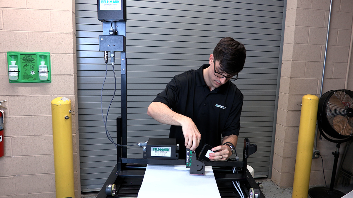 Print technician servicing an InteliJet TS